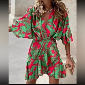 Bat sleeve ruffle dress 21 inches wide and 39 inches long